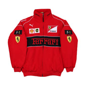 Red Ferrari jacket with various logos on a gray background