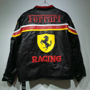 Black Ferrari racing jacket with red and yellow accents on a white background