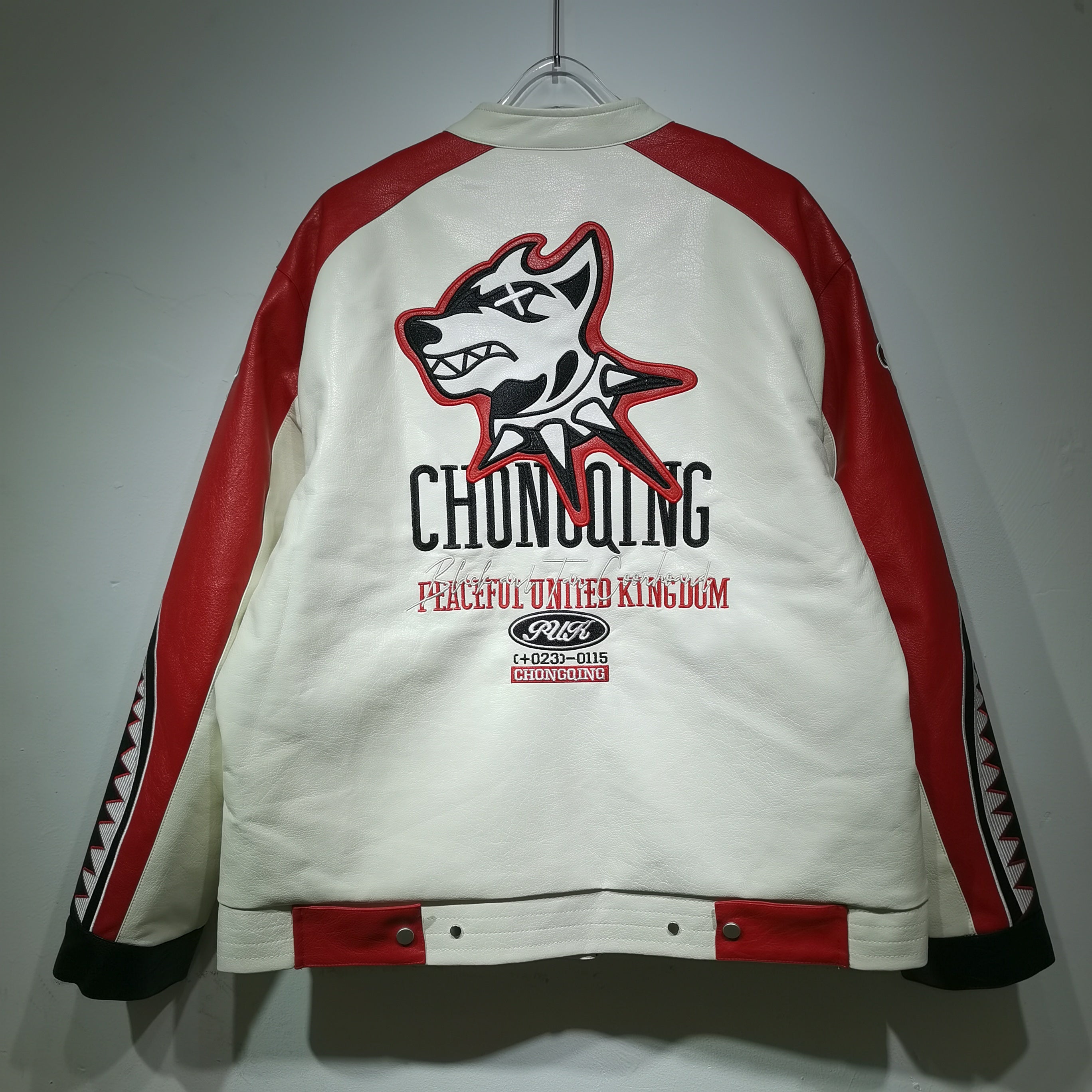 White and red jacket with a logo and text on a gray background